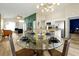 Modern open-concept living space with a dining room and kitchen at 131 Sonja Cir # 1, Davenport, FL 33897