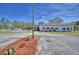 Exterior view of community center with pool in background at 16 Cedar Dr, Davenport, FL 33837