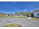 Edgehill community pool area with an in-ground pool, outdoor seating, and well-maintained landscaping at 16 Cedar Dr, Davenport, FL 33837