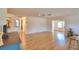 Bright living room showcasing hardwood flooring and an open floor plan at 16 Cedar Dr, Davenport, FL 33837