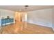 Living Room showcasing hardwood flooring, a ceiling fan, and abundant natural light at 16 Cedar Dr, Davenport, FL 33837