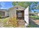 The backyard shed has open doors and shelving at 16 Cedar Dr, Davenport, FL 33837
