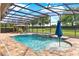 Spectacular pool area with a spa, gazebo, and manicured landscaping, designed for luxurious outdoor living at 16548 Caravaggio Loop, Montverde, FL 34756