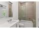 Modern bathroom featuring a vanity with marble countertop and a glass enclosed shower at 1660 Palmer Ave, Winter Park, FL 32789