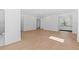 Open-concept living area with light hardwood floors and neutral walls leading to a modern bathroom at 1660 Palmer Ave, Winter Park, FL 32789