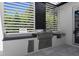 Outdoor kitchen features stainless steel appliances, counter space, and built-in storage at 1660 Palmer Ave, Winter Park, FL 32789