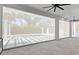 Covered patio features screens, ceiling fans, and an exceptional view of the backyard pool at 1660 Palmer Ave, Winter Park, FL 32789