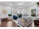 Bright and airy living room featuring stylish decor and ample space at 1763 White Feather Loop, Oakland, FL 34787