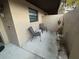 Relaxing outdoor patio area with seating, plants, and a peaceful atmosphere at 2284 Firestone Pl, Winter Haven, FL 33884