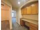 Hallway features built-in desk and cabinets at 2946 Ashland S Ln, Kissimmee, FL 34741