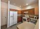 Well-lit kitchen with ample cabinet and counter space at 2946 Ashland S Ln, Kissimmee, FL 34741