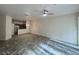 Open-concept living room with tile flooring and ceiling fan at 2946 Ashland S Ln, Kissimmee, FL 34741