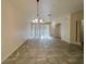 Open-concept living space with tile flooring and natural light at 2946 Ashland S Ln, Kissimmee, FL 34741
