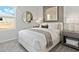 Inviting bedroom with a plush white bed, neutral tones, and ample natural light at 3626 Cambridge Brook Dr, Davenport, FL 33837