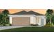 Charming single-story home featuring a two-car garage, neutral colors and lush landscaping at 3626 Cambridge Brook Dr, Davenport, FL 33837