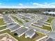 Aerial view of neighborhood showcasing homes and community layout at 425 Singing Sands Cir, Lake Wales, FL 33859