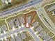 Aerial view of property highlighting lot lines in residential community at 425 Singing Sands Cir, Lake Wales, FL 33859