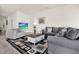 Comfortable living room with tile flooring, neutral paint, and lots of natural light at 425 Singing Sands Cir, Lake Wales, FL 33859