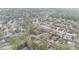 Aerial neighborhood view showcasing winding roads, lush greenery, and the neighborhood's layout at 432 Wilderness Dr, Longwood, FL 32779