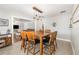 Bright dining area featuring modern light fixture, tile floors, and neutral paint at 432 Wilderness Dr, Longwood, FL 32779