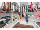 Large walk-in closet with custom shelving and ample storage space for clothes and accessories at 432 Wilderness Dr, Longwood, FL 32779