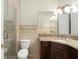 Bathroom featuring a glass shower, granite countertop vanity, and tile flooring at 5138 Fairway Oaks Dr, Windermere, FL 34786