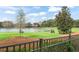 Scenic golf course view from property showcasing serene lakes and manicured greens at 5138 Fairway Oaks Dr, Windermere, FL 34786