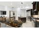 Gourmet kitchen with double islands, stainless steel appliances, and custom cabinetry at 5138 Fairway Oaks Dr, Windermere, FL 34786