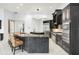 Gourmet kitchen with double islands, seating, and professional-grade appliances at 5138 Fairway Oaks Dr, Windermere, FL 34786