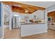 Bright kitchen featuring stainless steel appliances, white cabinets, and a gray countertop island at 525 S Crystal Lake Dr, Orlando, FL 32803
