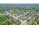 This beautiful suburban neighborhood is displayed from above, with tree-lined streets and single-Gathering homes at 615 Blue Park Rd, Orange City, FL 32763