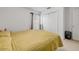 Comfortable bedroom with closet and window at 615 Blue Park Rd, Orange City, FL 32763