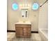 Bathroom with vanity, octagonal windows, and a shower-tub combination at 615 S Laurel Ave, Sanford, FL 32771