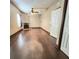 Spacious living room featuring hardwood floors, fireplace, and a ceiling fan at 615 S Laurel Ave, Sanford, FL 32771