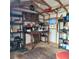 Functional shed interior with table, shelves, and storage for tools and other items at 615 S Laurel Ave, Sanford, FL 32771