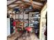 Inside the shed you'll find an organized workspace with shelves, work bench, and storage solutions at 615 S Laurel Ave, Sanford, FL 32771