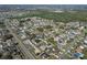 Aerial view of the community, showcasing the home's location relative to nearby services and schools at 702 Pelican Ct, Kissimmee, FL 34759