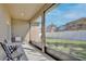 Outdoor patio with furniture and a view of the large fenced backyard at 702 Pelican Ct, Kissimmee, FL 34759