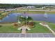 Attractive water feature with fountains and colorful plantings at 702 Pelican Ct, Kissimmee, FL 34759