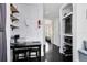 Cozy hallway with black floors, small breakfast nook, and stainless steel microwave at 726/720 N Pennsylvania Ave, Winter Park, FL 32789