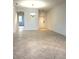 Spacious living room featuring bright interiors and neutral ceramic tile flooring at 7681 Fordson Ln, Windermere, FL 34786