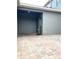 Private outdoor patio area with paved brick flooring at 7681 Fordson Ln, Windermere, FL 34786