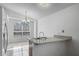 Kitchen featuring a breakfast bar, and a chandelier at 8519 Rainbow Ave, Orlando, FL 32825