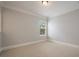 Neutral bedroom with bright natural light and neutral carpet, providing a calm and peaceful space at 9454 Becker Ct, Orlando, FL 32827
