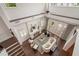 Living room featuring a fireplace, high ceilings, dark wood floors, and double glass doors to the patio at 9454 Becker Ct, Orlando, FL 32827