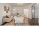 Cozy living room featuring hardwood floors, neutral decor, and natural light at 9454 Becker Ct, Orlando, FL 32827
