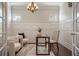 Bright office space with custom trimwork, a stylish desk, and comfortable chairs at 9454 Becker Ct, Orlando, FL 32827