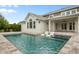 Inviting backyard with swimming pool, sun loungers, and outdoor living space for relaxation and entertainment at 9454 Becker Ct, Orlando, FL 32827