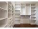 Spacious walk-in closet with custom built-in shelving and drawers at 9454 Becker Ct, Orlando, FL 32827