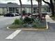 Complex entrance with landscaped islands and parking at 946 Lake Destiny Rd # D, Altamonte Springs, FL 32714